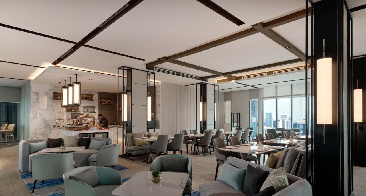 Pan Pacific Serviced Suites Kuala Lumpur Exteriér fotografie The Club at Changi Airport